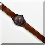 J114. Citizen Eco-Drive watch with brown leather band. Model WR-100. Running. - $68